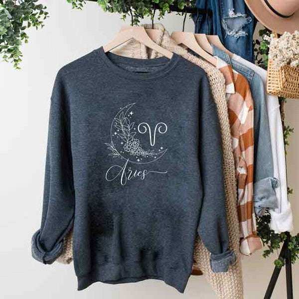 grey aries sweatshirt on a hanger