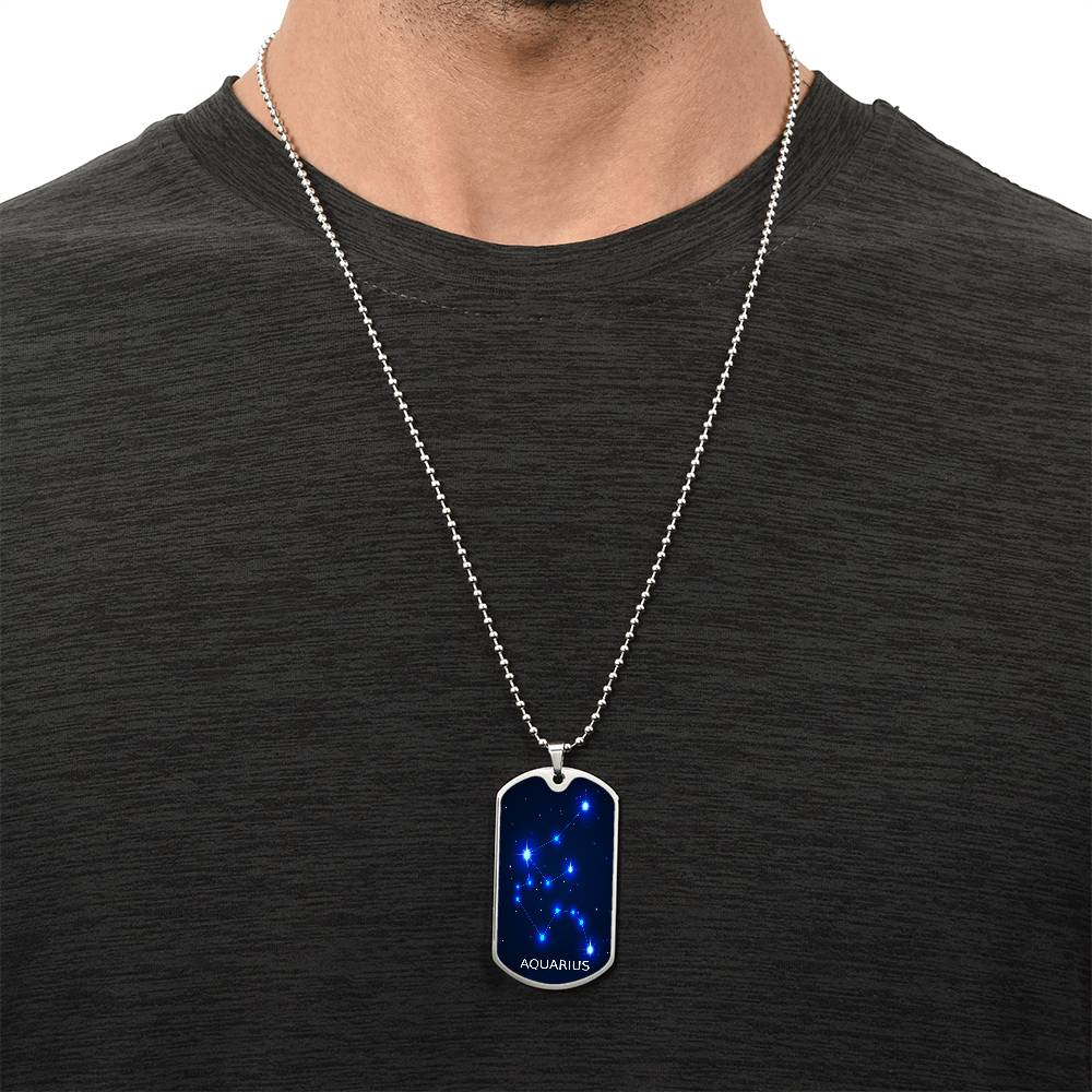 blue constellation necklace hanging on a mans neck
