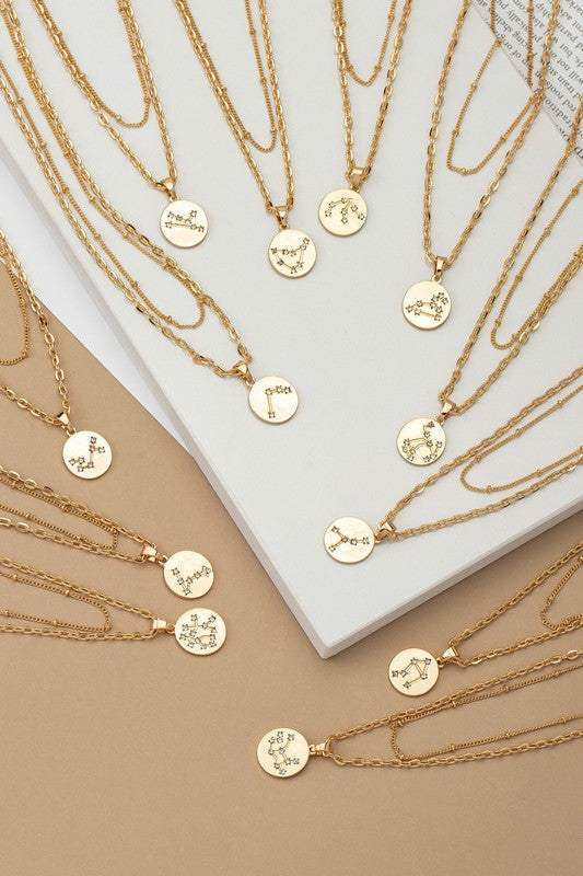  12Zodiac Constellation Necklaces toward center of table