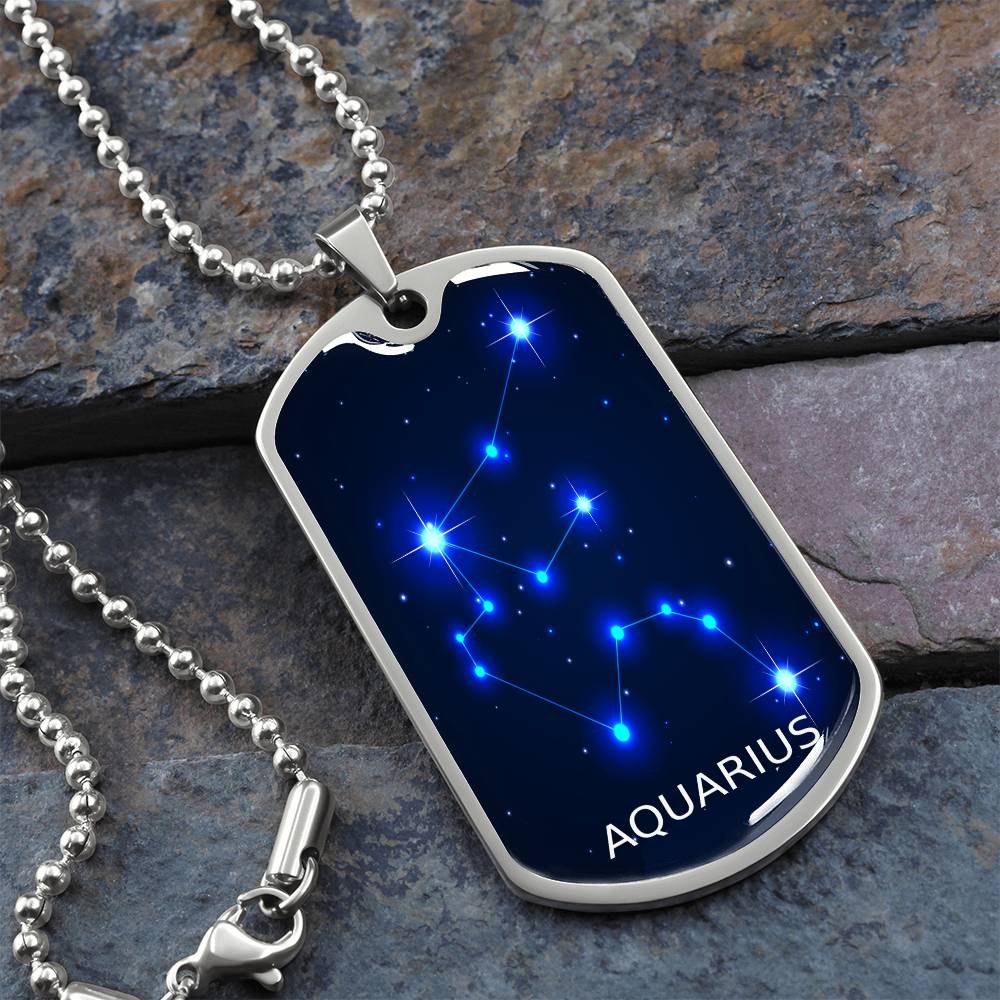 Aquarius blue constellation necklace laying on shale tiles